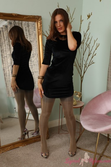 Asha Evans In A Sexy Black Dress And Nylons 1