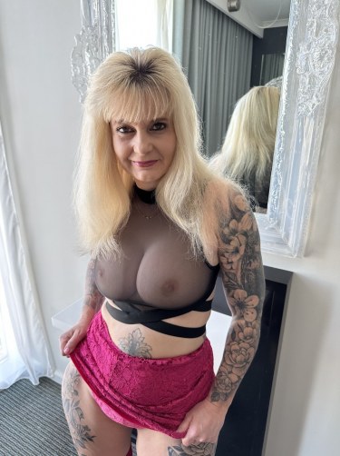 Inked Milf In Hot Pink Mini Skirt And See Through Top 5