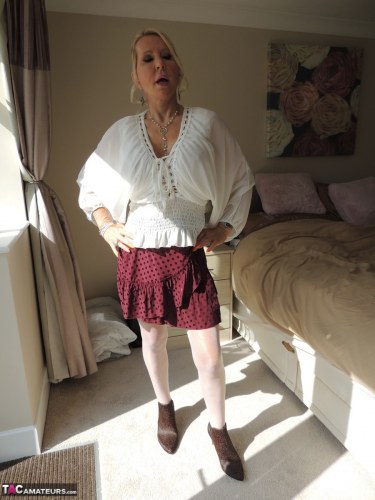 Emerald In Mini Skirt And Stockings 1