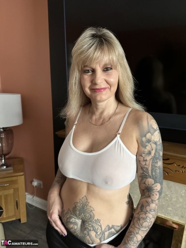 Inked Milf In Fishnet Stockings 6