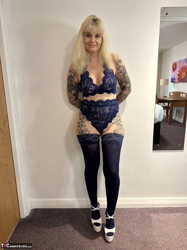 Inked Milf In Matching Top And Bottoms With Stockings And Heels 1