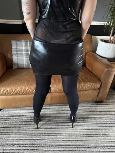 Inked Milf In Shiny Black Dress Stockings And Heels 2